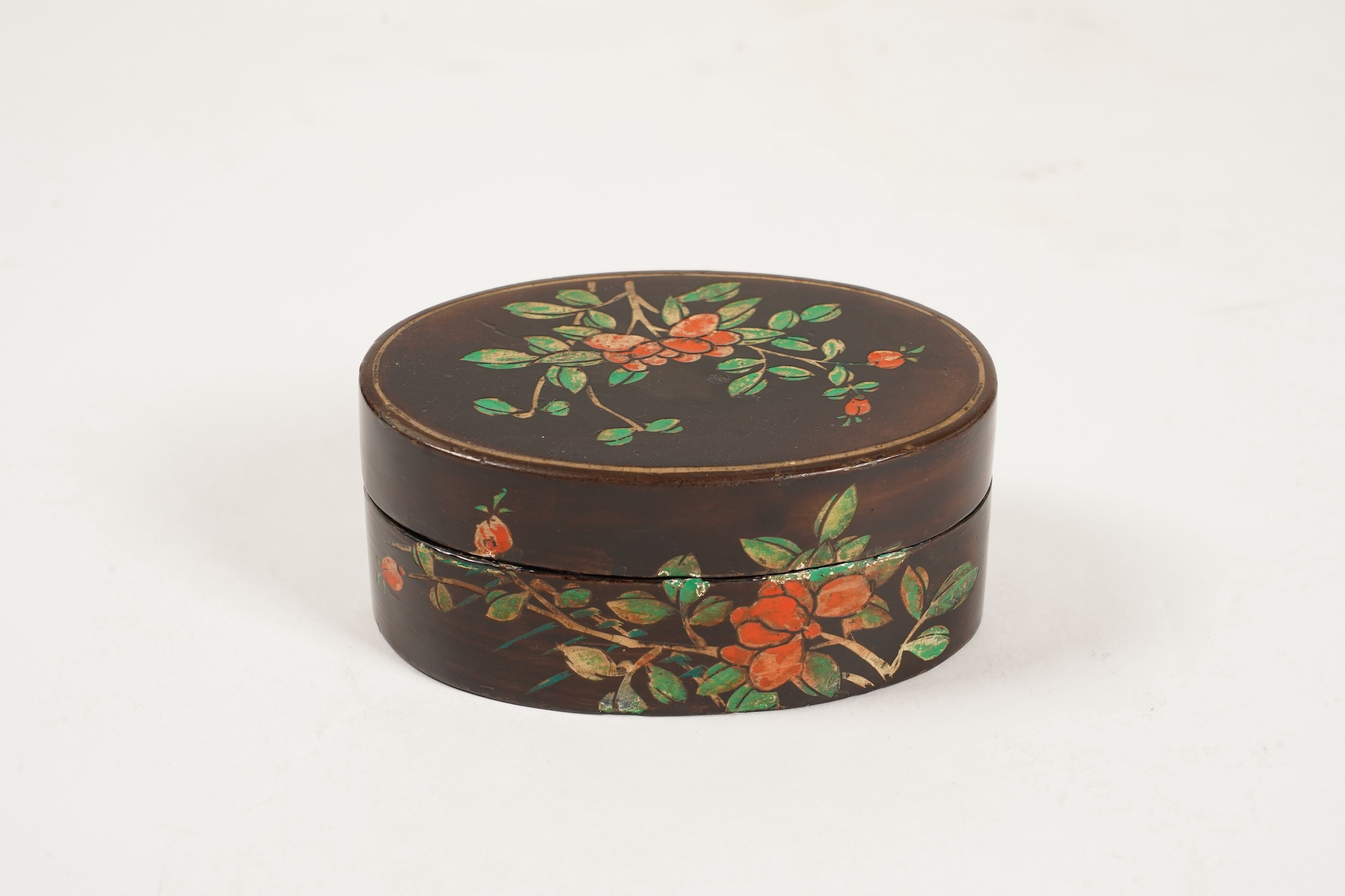 A small Chinese coromandel lacquer oval box, Kangxi period
